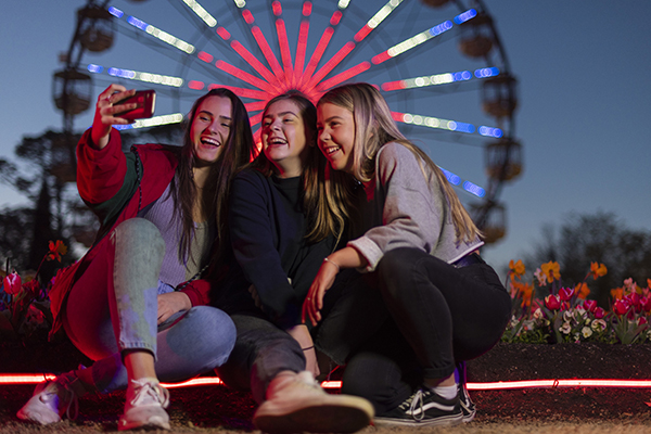 Friends enjoying NightFest Floriade Canberra