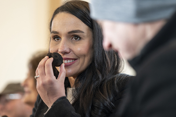 Woman smelling a truffle 
