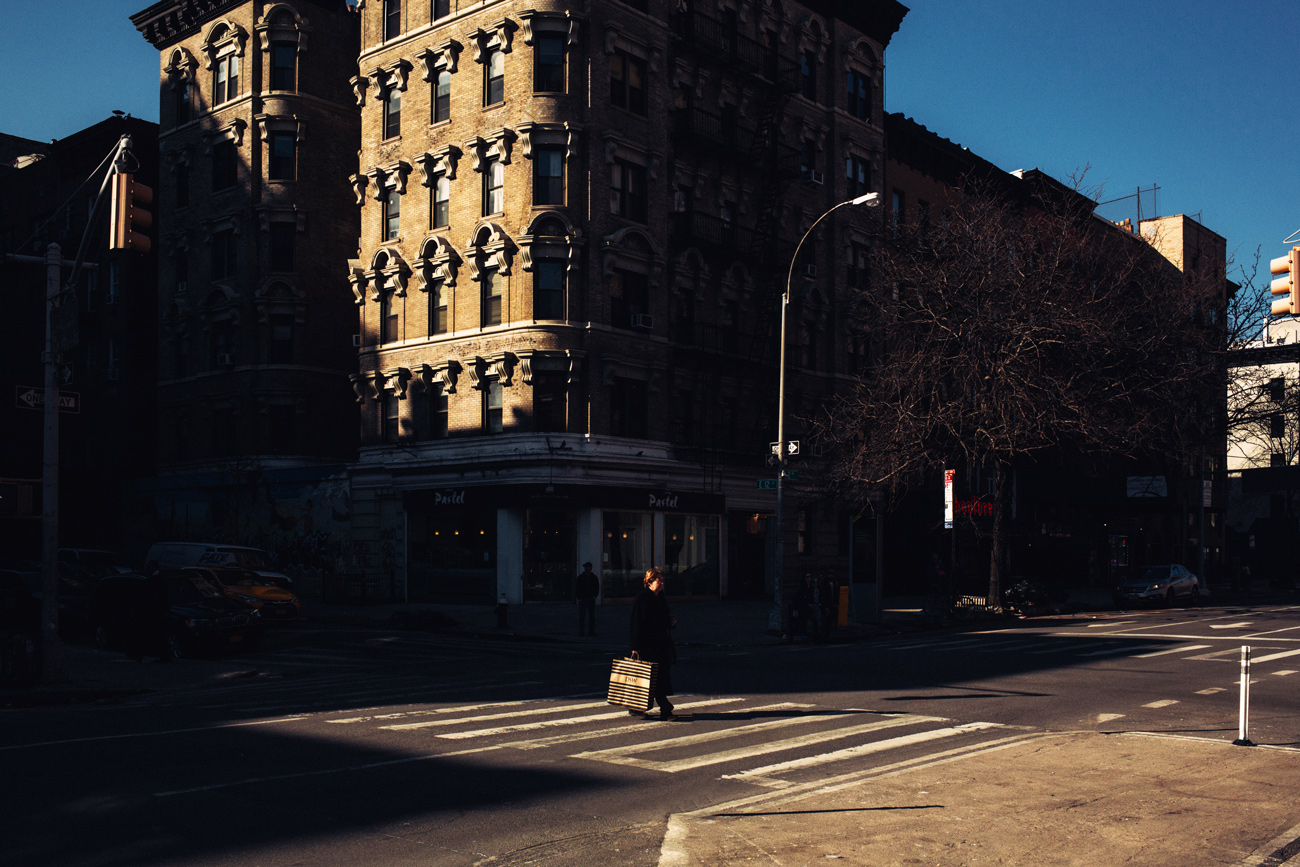 new york street photo buildings slice of light