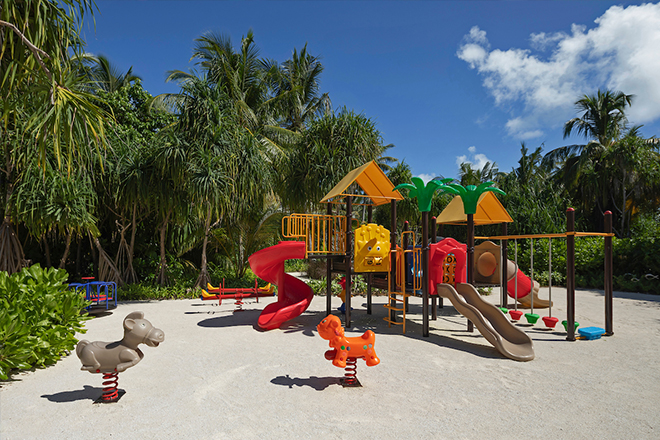 Maldives family resort: outdoor playground at the Pullman Maldives Maamutaa Resort