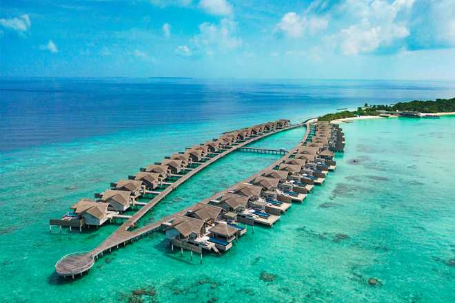 Maldives family resort: overwater bungalows at Fairmont Maldives Sirru Fen Fushi