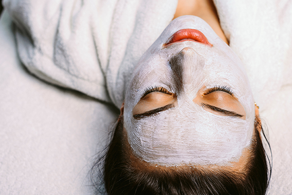 woman enjoying a facial treatment