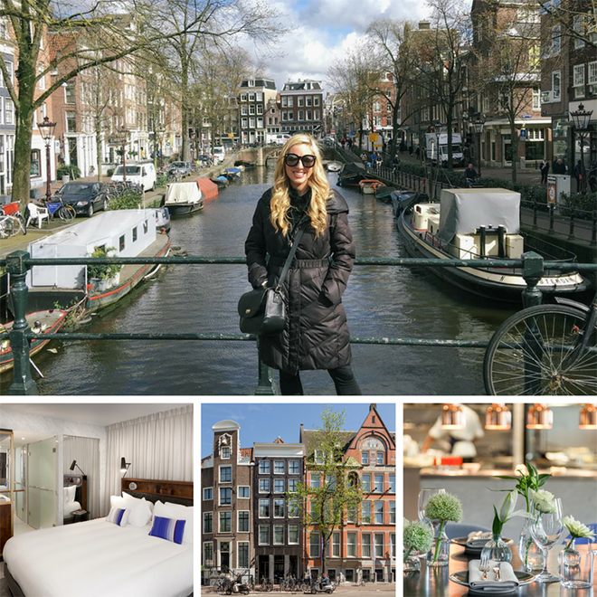 Competition winner Chloe with long blonde hair, wearing a black jacket standing on a bridge in Amsterdam with a river and boats behind her, and side streets and tall buildings on the river bank