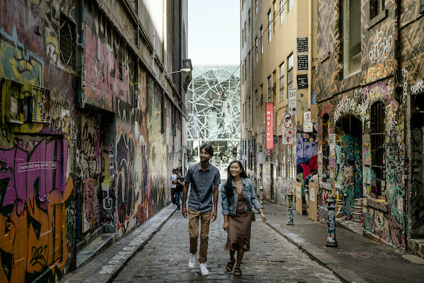Couple exploring CBD Alley, Melbourne 
