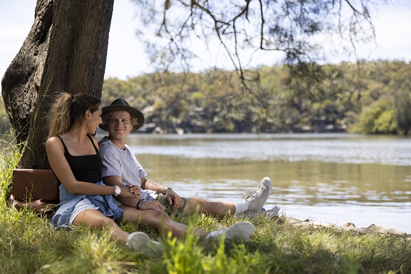 Couple enjoying the views across the scenic Georges River