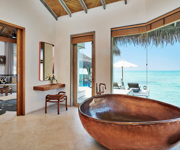A luxurious copper tub at Fairmont Maldives Sirru Fen Fushi