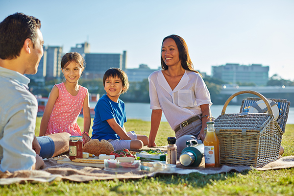 Family picnic on Brisbane's South Bank is a great family staycation idea