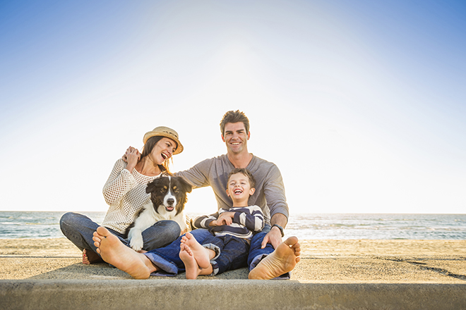 Family on holiday with pet 