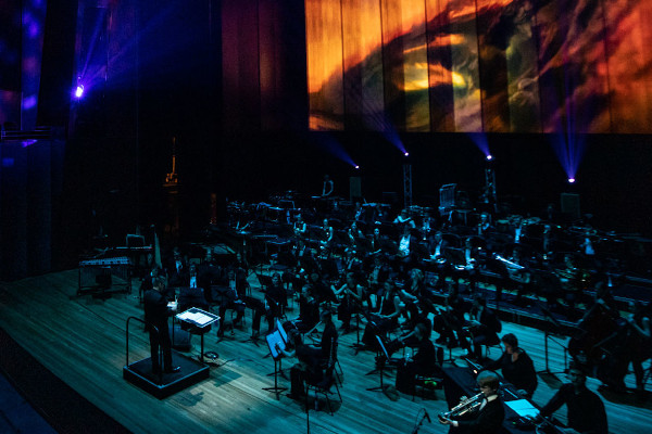 A LIVE ORCHESTRA PLAYS IN FRONT OF FILMS AT FILMHARMONIC, BRISBANE FESTIVAL 2021.