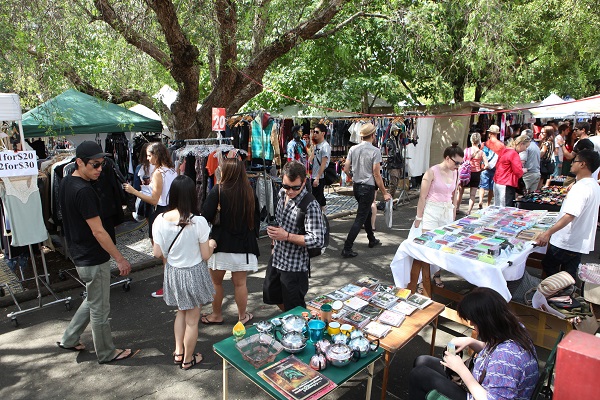 People walking through the Glebe Markets, Sydney