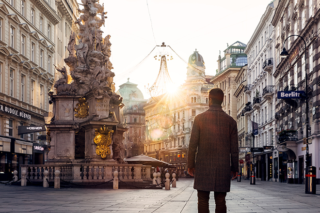 Image 1 - Rear view of a man on the streets of Vienna, Austria