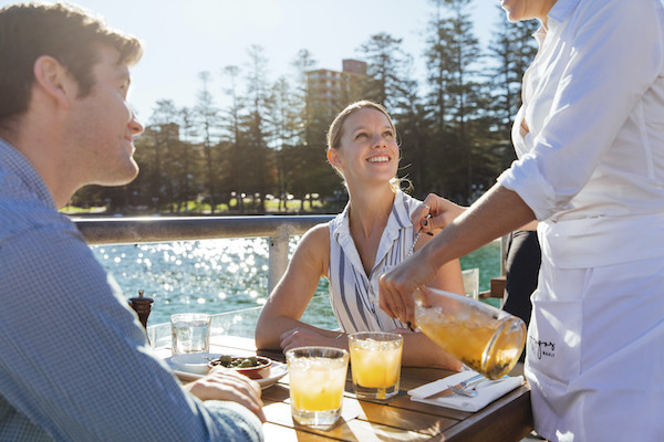 Couple dining at Hugos Manly 