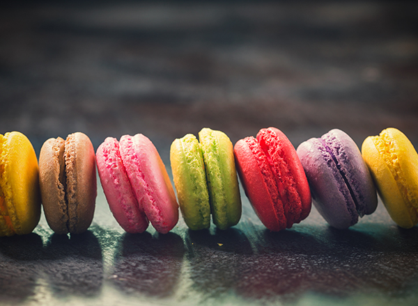 Assorted sweet colorful French macarons with different flavors