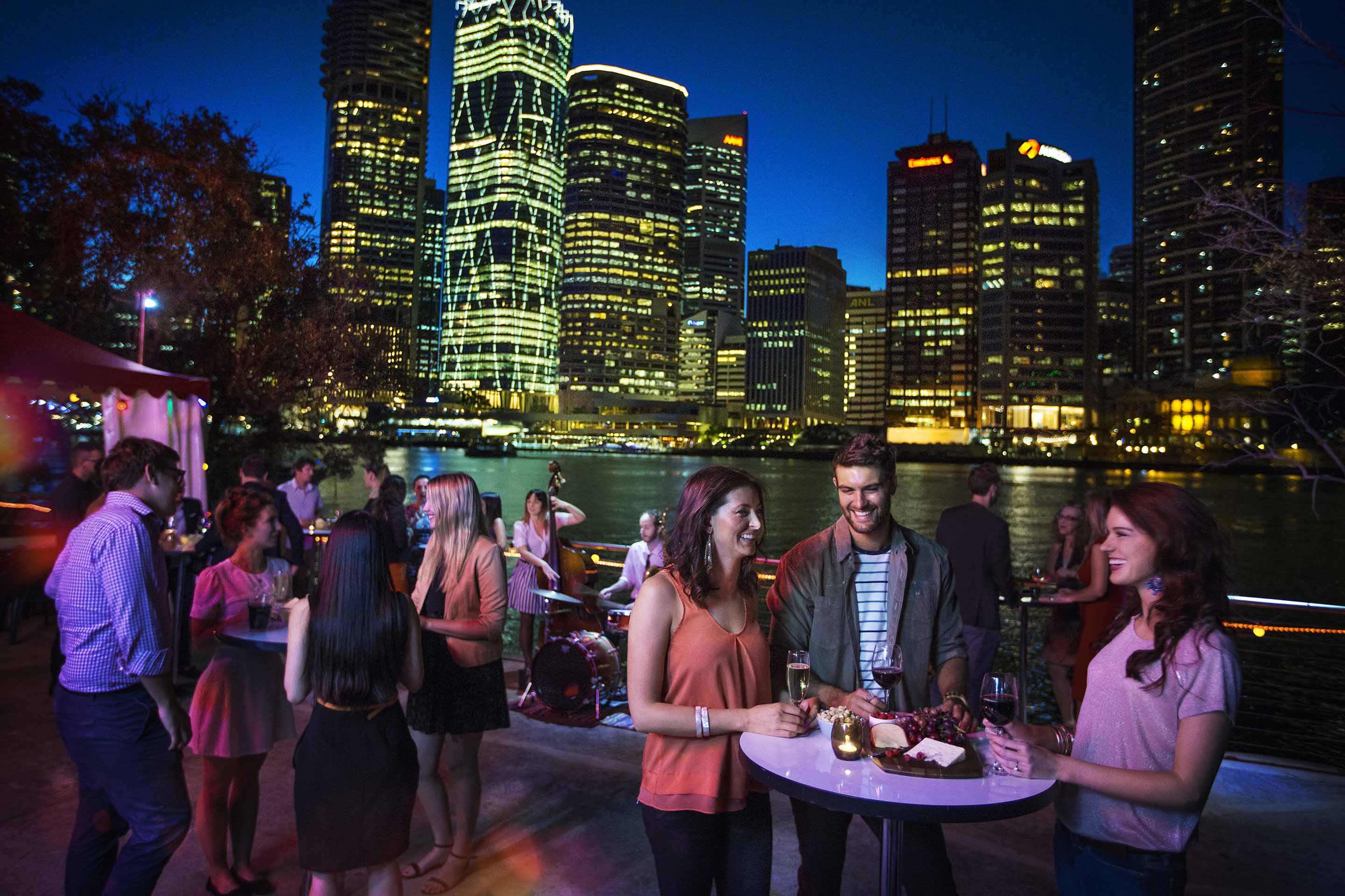 The Howard Smith Wharves transform into a trendy outdoor jazz bar at night Credit: Tourism Australia