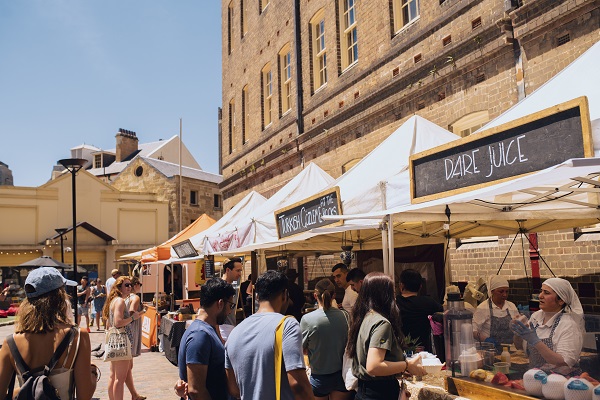 People enjoying a day at the Rocks Markets, Sydney