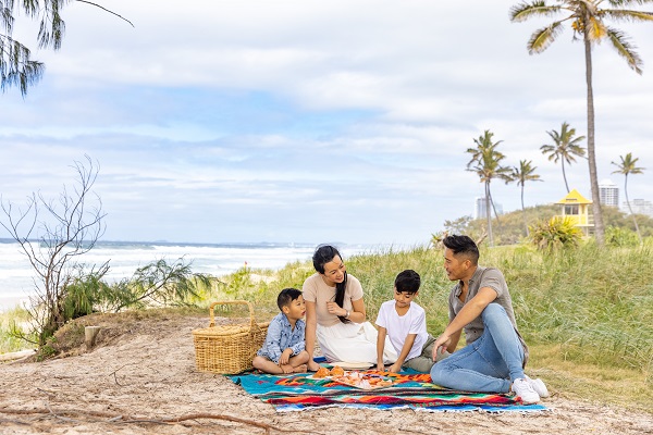 A family having a beachside picnic together