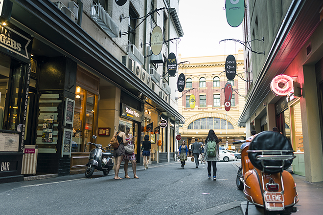 People walking down a quiet laneway in Melbourne CBD