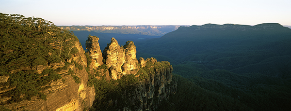 The Blue Mountains show off their cool-toned hue as the sun starts to shine Image credit: Tourism Australia