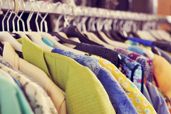 Shirts on a rack in a vintage clothing shop